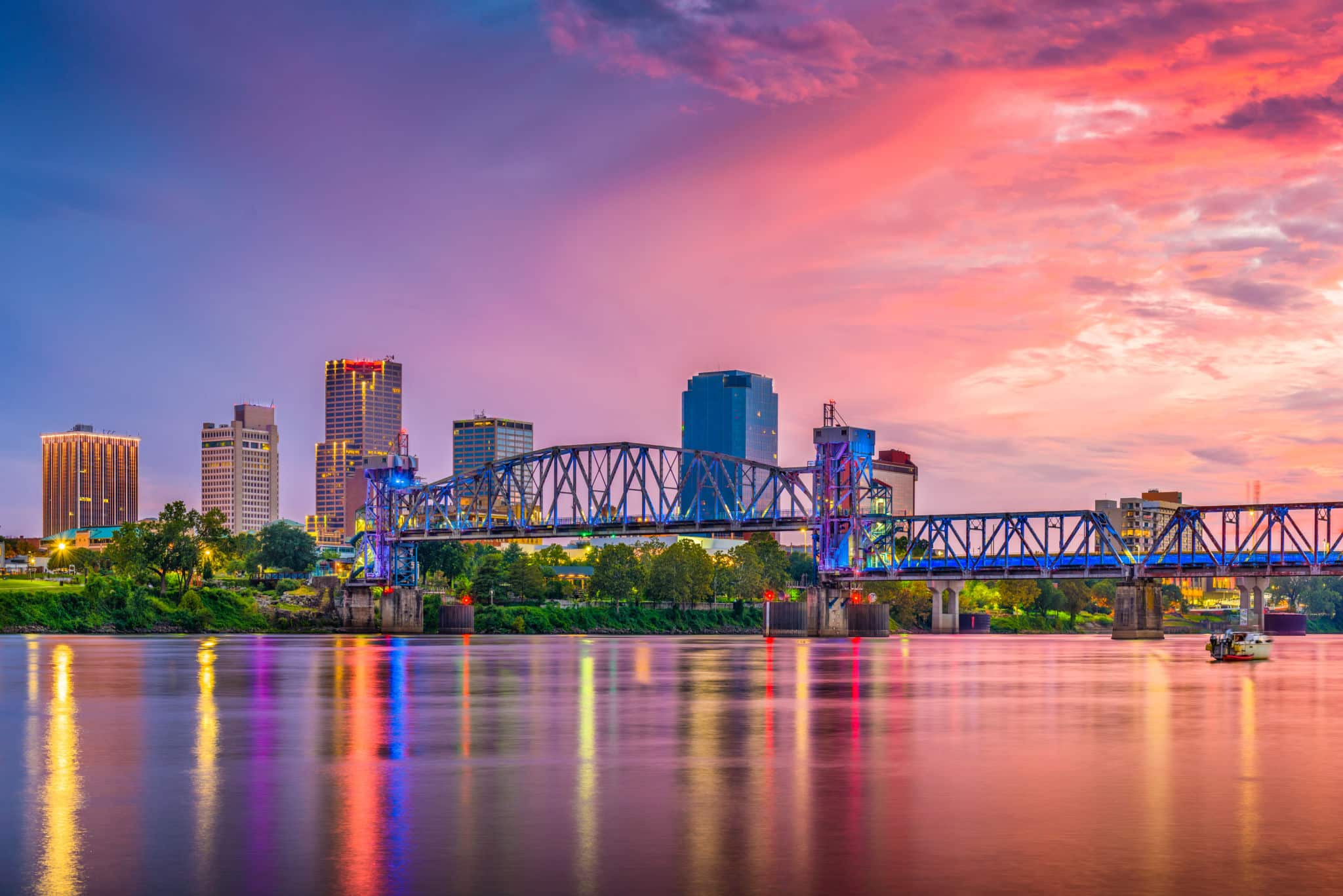 The Little Rock skyline and Junction Bridge over the Arkansas River at sunset
